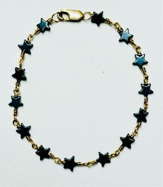 Pulsera estrellas de hematite en oro laminado 18KT