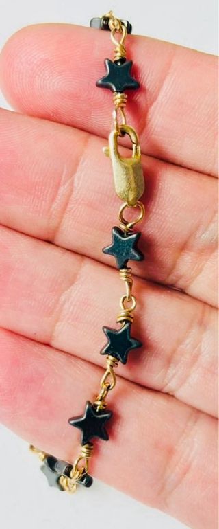 Pulsera estrellas de hematite en oro laminado 18KT