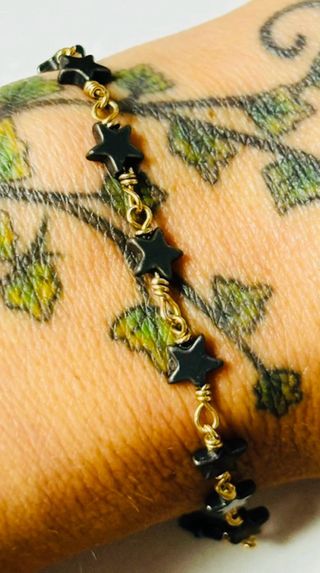 Pulsera estrellas de hematite en oro laminado 18KT