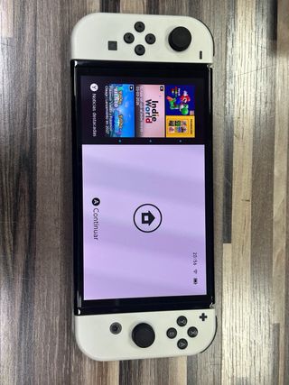 Nintendo Switch OLED + 3 Giochi Pokémon