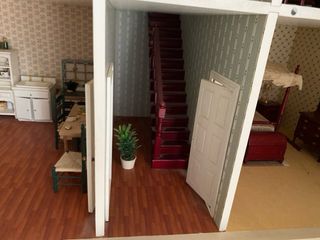 Casa de muñecas de madera