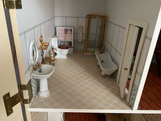 Casa de muñecas de madera