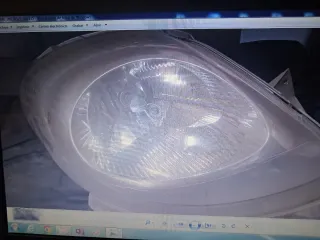 Faro delantero derecho y paraje trafic