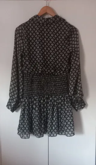 Vestido babydoll con mangas semitransparentes