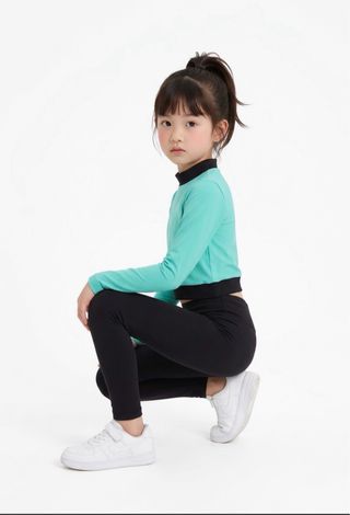 Blusa deportiva licra bicolor niñas. Talla 6