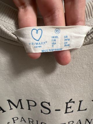 Sudadera beige Primark Champs-Élysées
