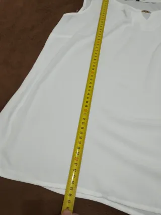 Blusa blanca sin mangas de Antea, talla L