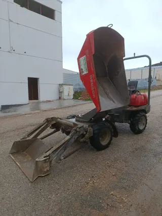 Dumper Neuson 2001 4x4 con tolva giratoria y pala.