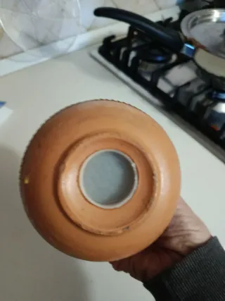 Portacandele e salvadanaio in terracotta