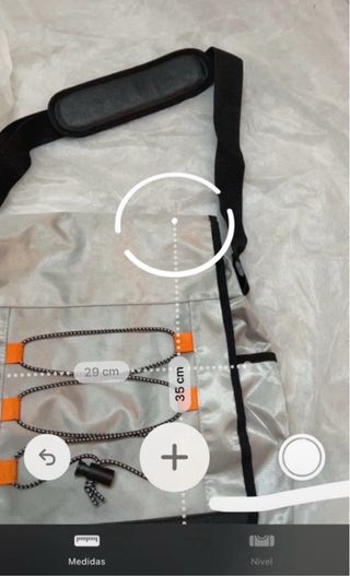 bandolera multibolsillos espaciosa