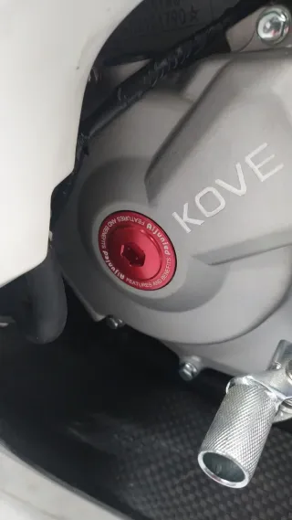 Kove 450  bombas de freno y tapa motor