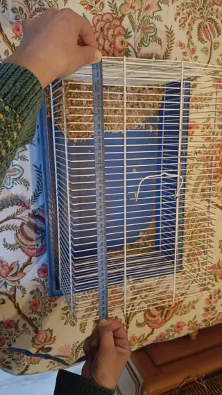 Jaula para hámster azul y blanca