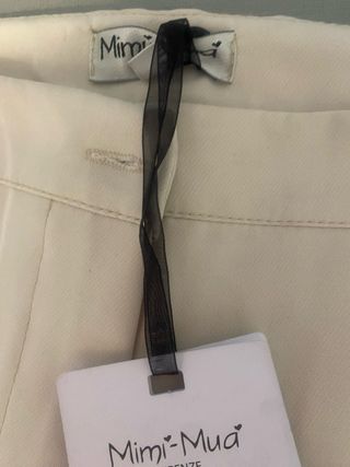 Pantalones beige mujer cremallera