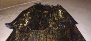 Falda larga festiva negra y dorada