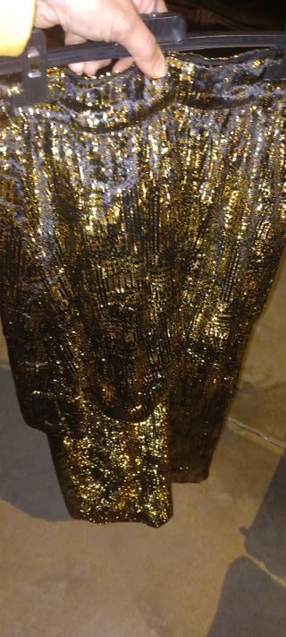 Falda larga festiva negra y dorada