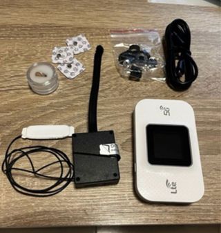 Cámara con pinganillo y router