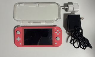 Nintendo switch lite con cargador y carcasa