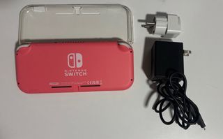 Nintendo switch lite con cargador y carcasa