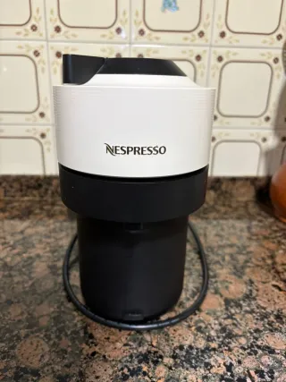 Cafetera Nespresso Blanca y Negra