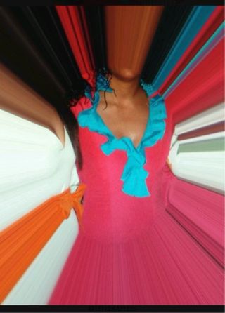 Traje de flamenca rosa fucsia con volantes