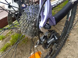 Bicicleta Orbea Morada y Blanca