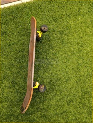 Monopatín vintage naranja