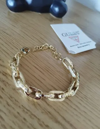 Pulsera Guess Eslabones Dorados