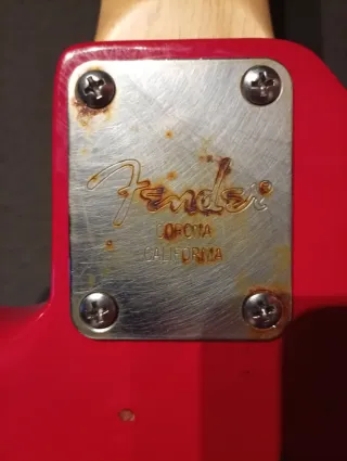 Bajo Fender Squier 90s Rojo