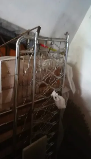 Cuna metálica torneada