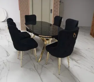 Mesa de comedor mármol y metal dorado