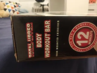 Barra de dominadas para puerta