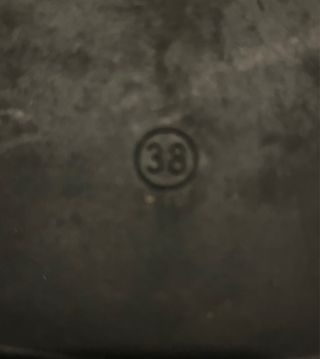 Mocasines de piel negros con hebilla dorada