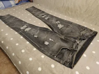 Nuevos Jeans grises hombre rotos