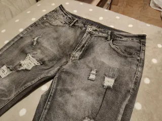 Nuevos Jeans grises hombre rotos