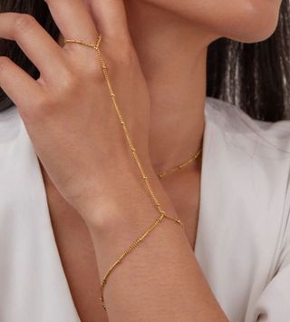 Pulsera de mano fina oro 18K nueva.