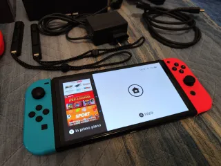 Nintendo Switch OLED con accessori e giochi