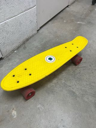 Monopatín amarillo poco uso