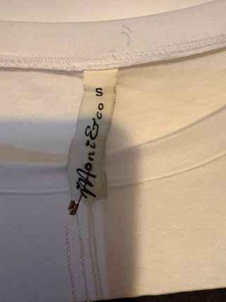 T-shirt con frange e stampa