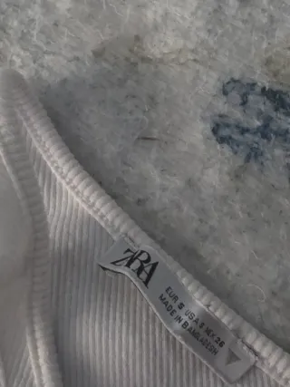 Top asimétrico blanco talla S