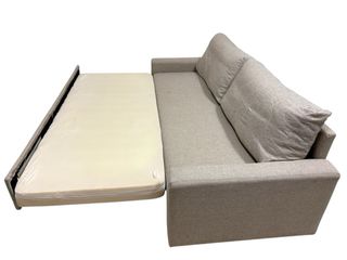 Sofá cama gris.