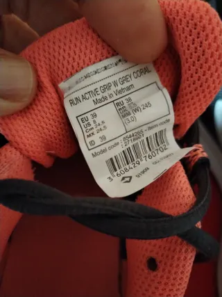 Zapatillas unisex running Kalenji negras y salmón