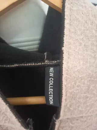 Cazadora con capucha rosa y negra