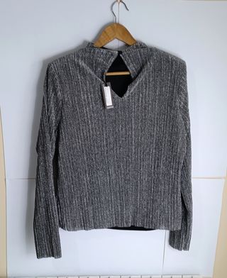 Blusa plateada elegante forrada hombreras 52