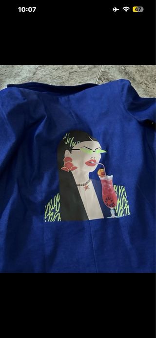 Chaqueta azul con volantes