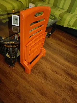 Silla de playa naranja plegable