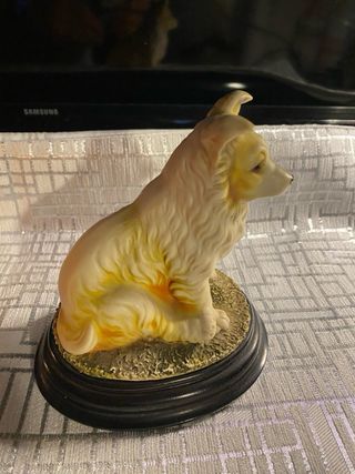 Figura de perrito sentado
