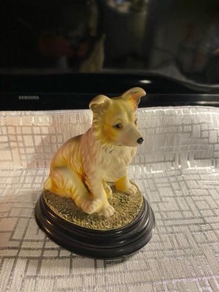 Figura de perrito sentado