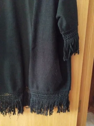 Chaqueta negra con flecos
