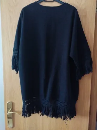Chaqueta negra con flecos