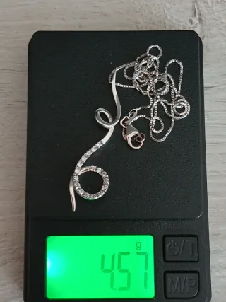 Collana in oro 750 e acciaio